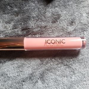Iconic london lip plumping gloss in peek a boo